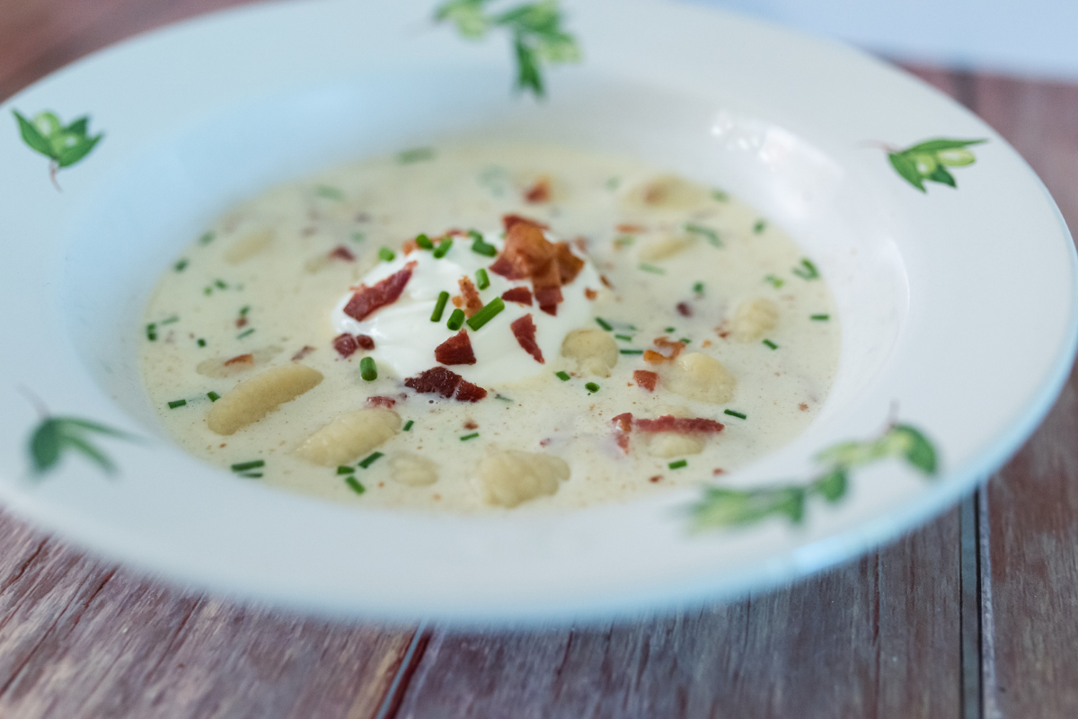 A bowl of loaded gnocchi soup