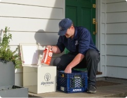 Milkman delivering porch