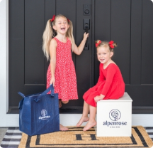 Girls at door with porch box